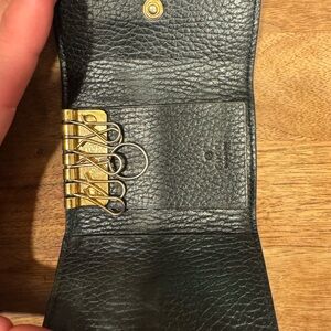 Gucci Black Leather Key Holder with Gold Accents